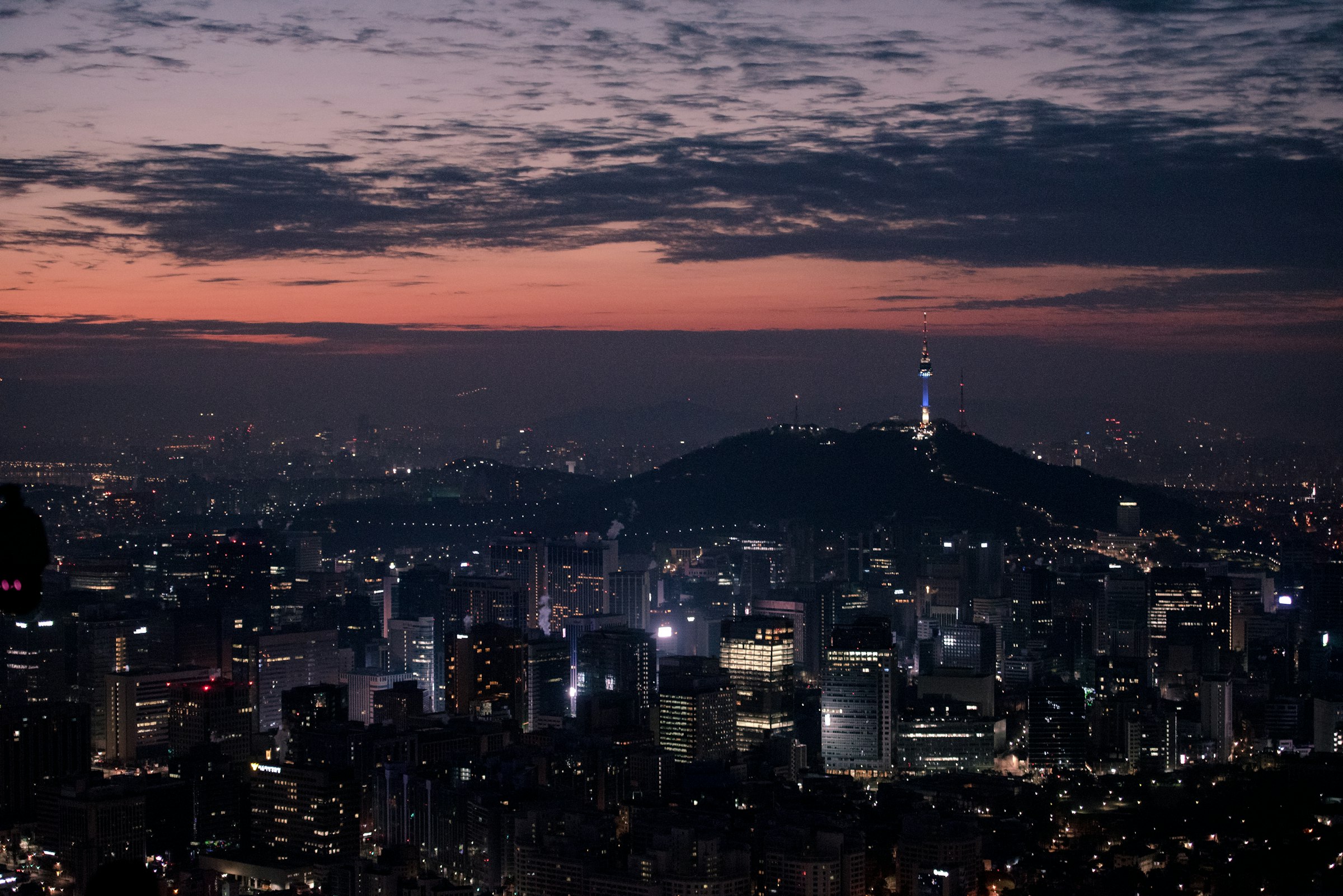 Seoul cityscape at dusk with N Seoul Tower